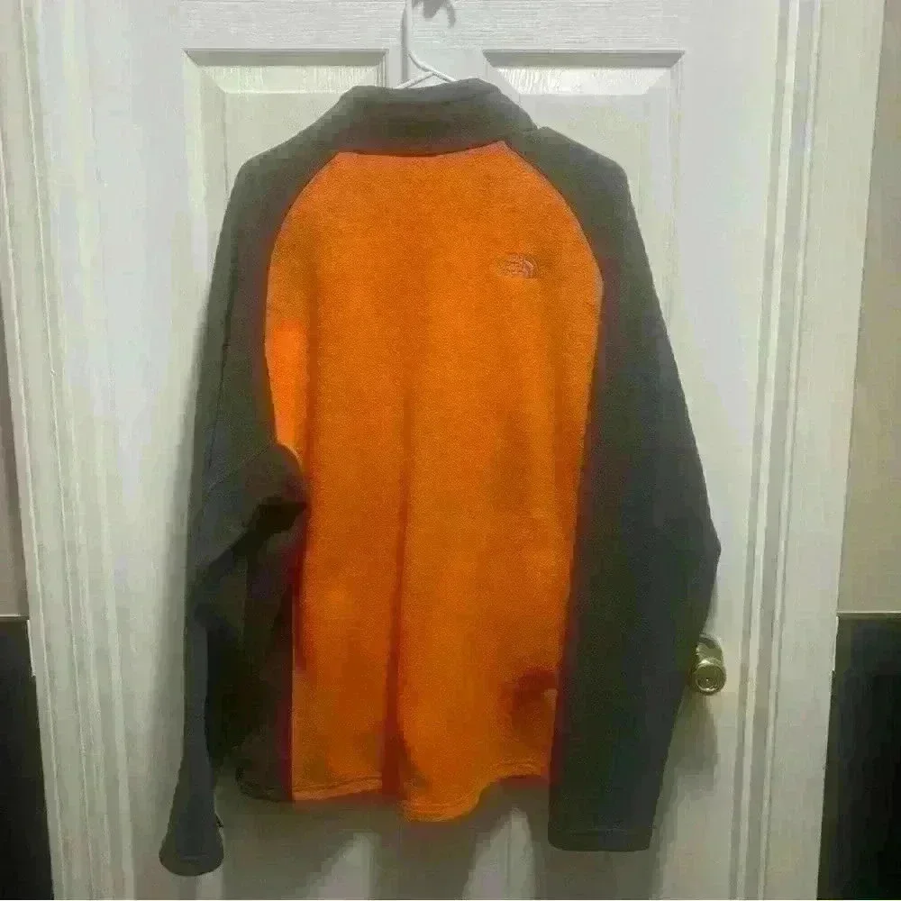 The North Face - orange and gray fleece jacket